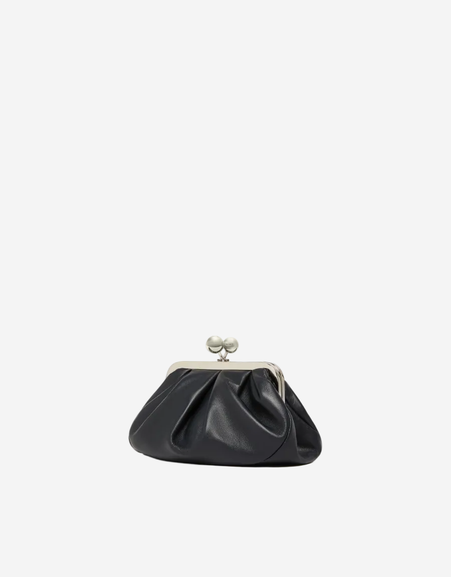 Black clutch bag with a metallic clasp on a white background