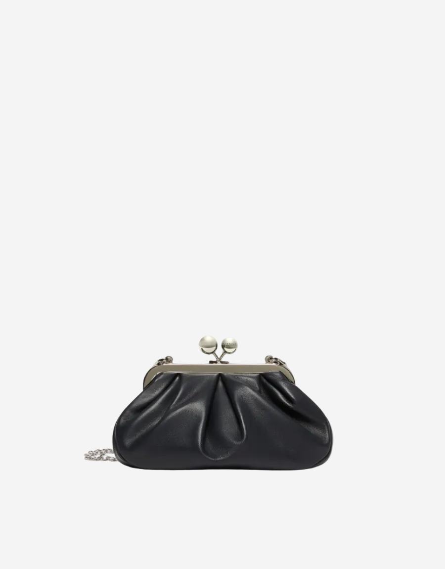 Black handbag with a chain detail on a white background