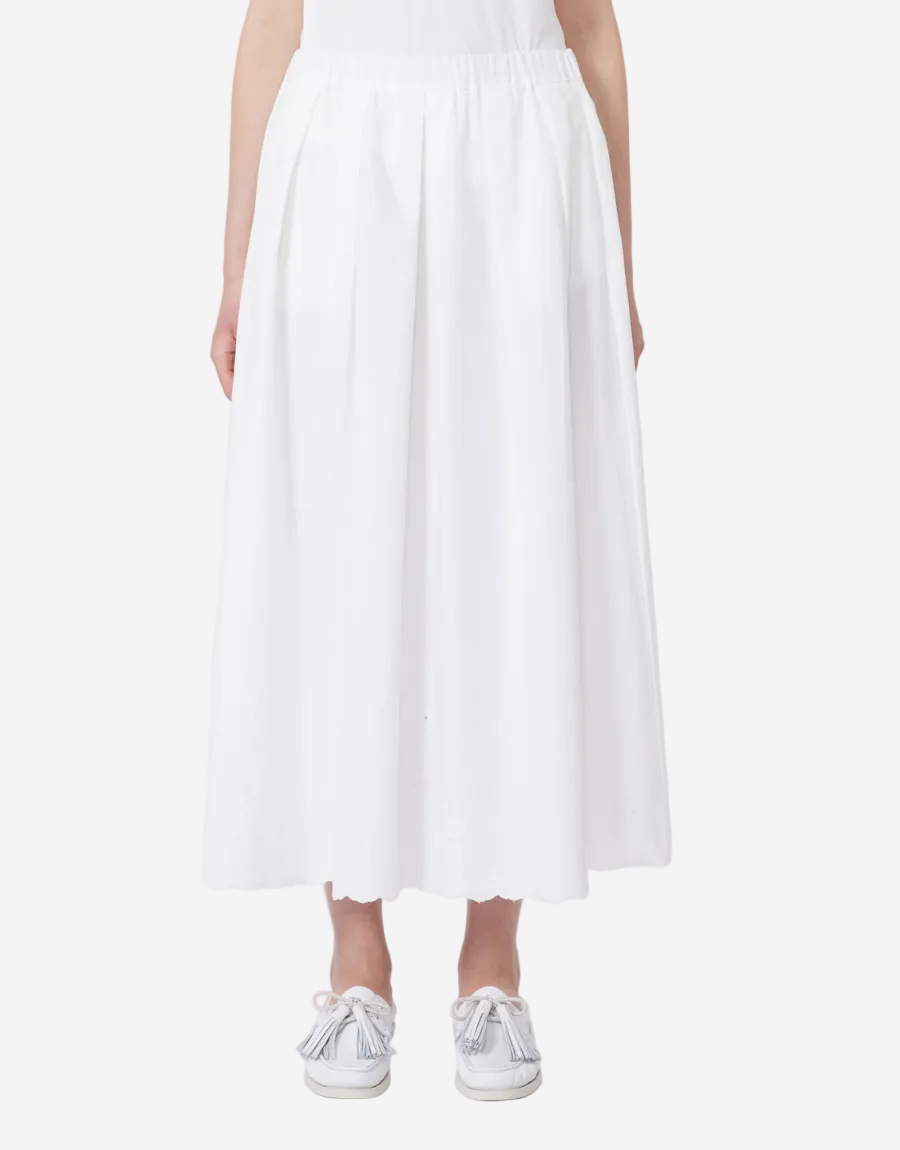White dress worn by a person on a white background