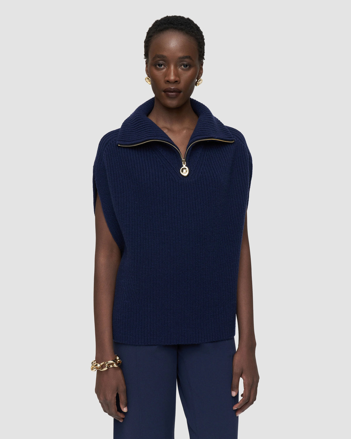 Front view of the JOSEPH Raffet sleeveless fisherman rib knit with high neck and gold-tone bean zip