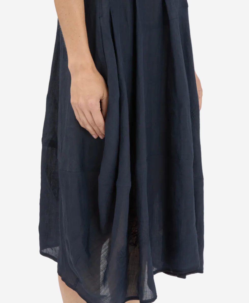 Navy blue dress with a plain white background