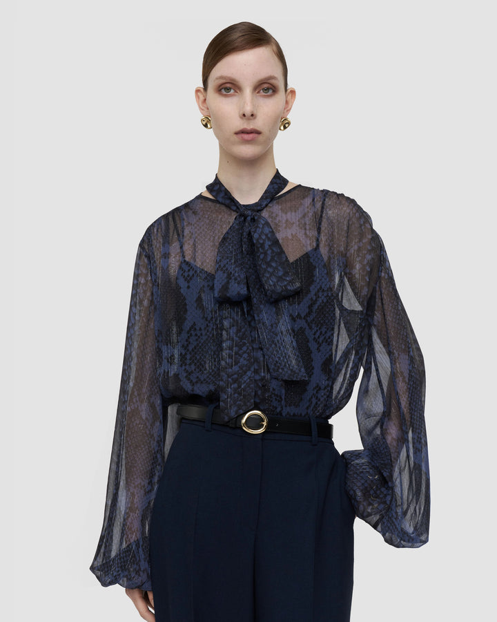 JOSEPH Sally sheer chiffon blouse in Prussian blue snake print with neck tie, worn at Christensen Copenhagen Sydney