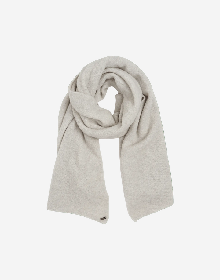 Beige scarf on a green background