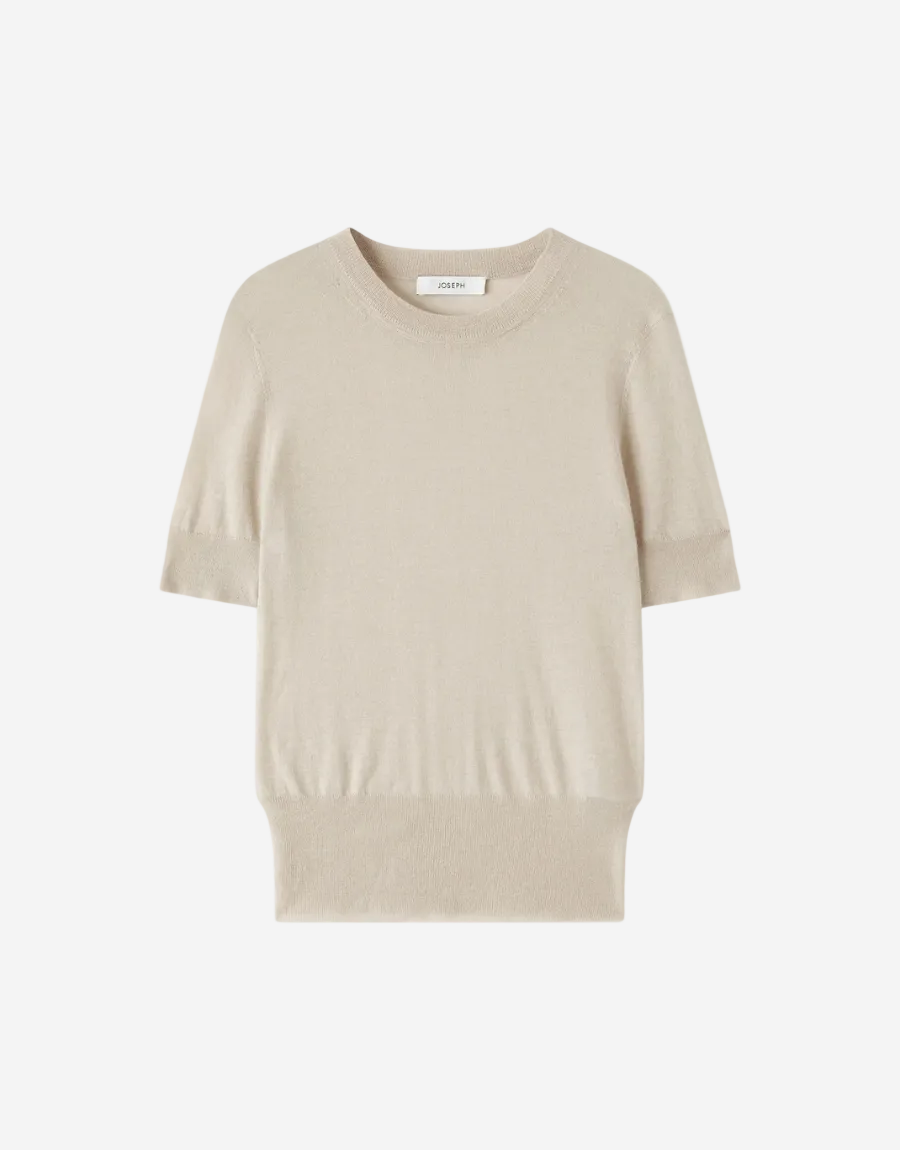Beige sweater on a white background