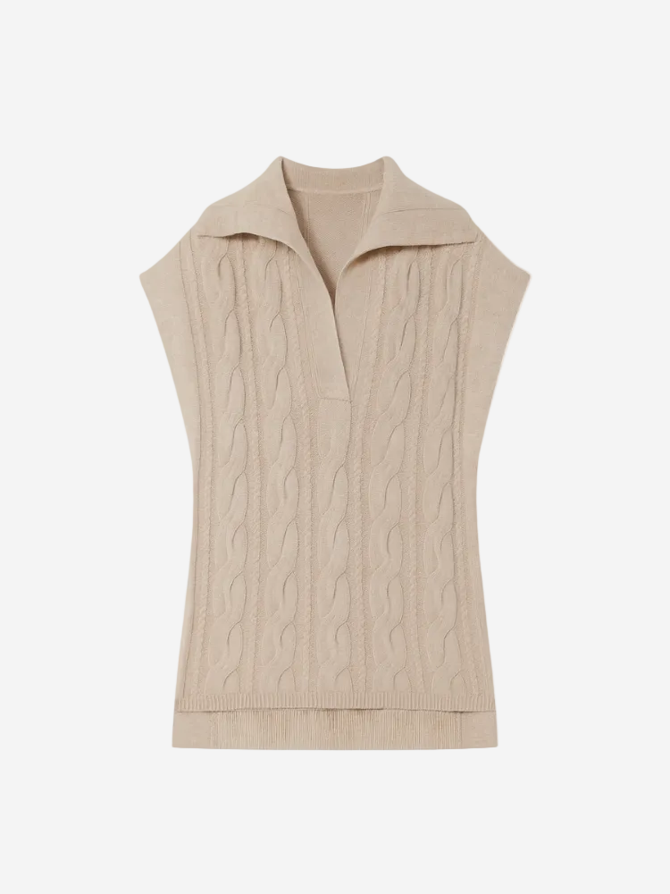 Beige cable knit sleeveless sweater on a white background