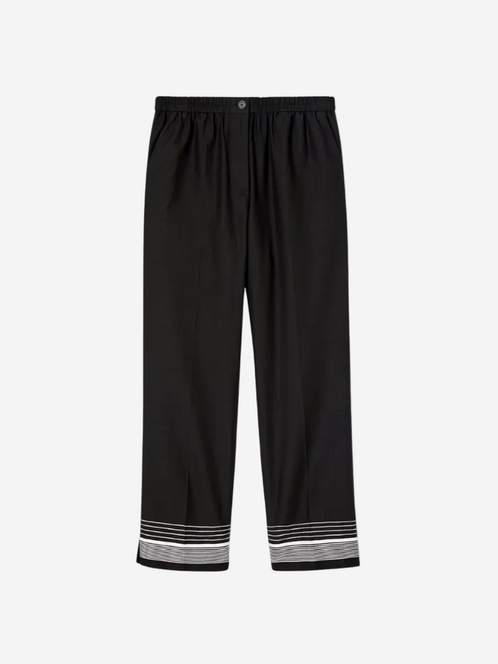 Black pants with striped cuffs on a white background