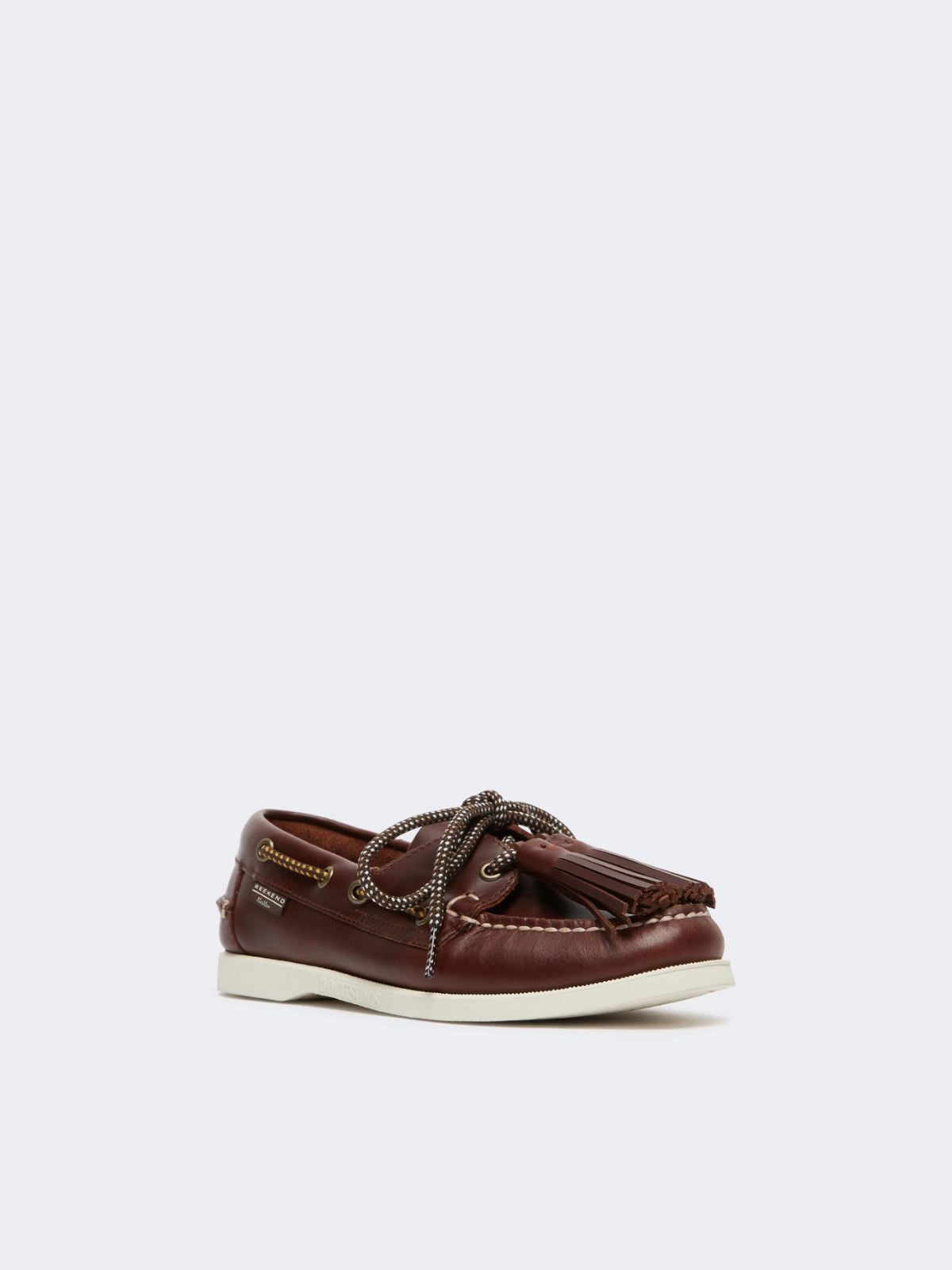 Brown leather shoe with tassels on a white background at Christensen Copenhagen