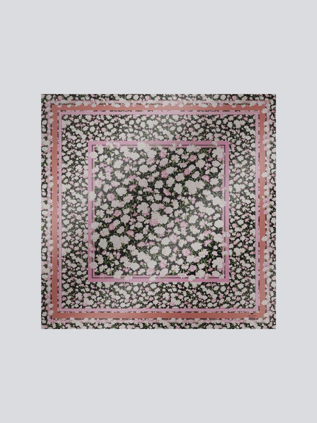 Floral patterned fabric with a pink border on a white background
