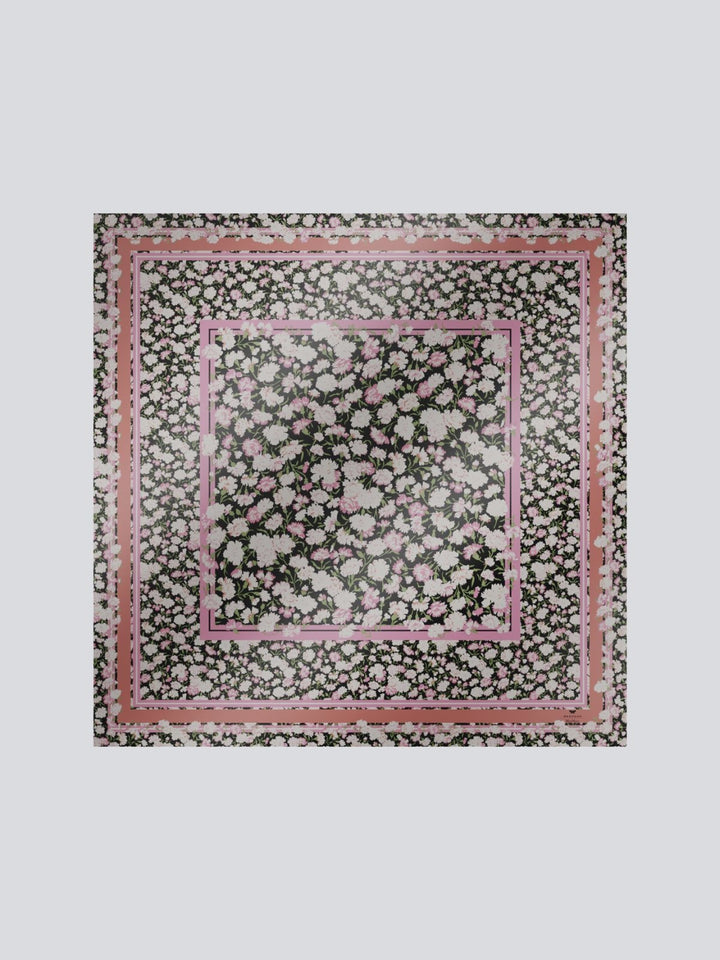Floral patterned fabric with a pink border on a white background