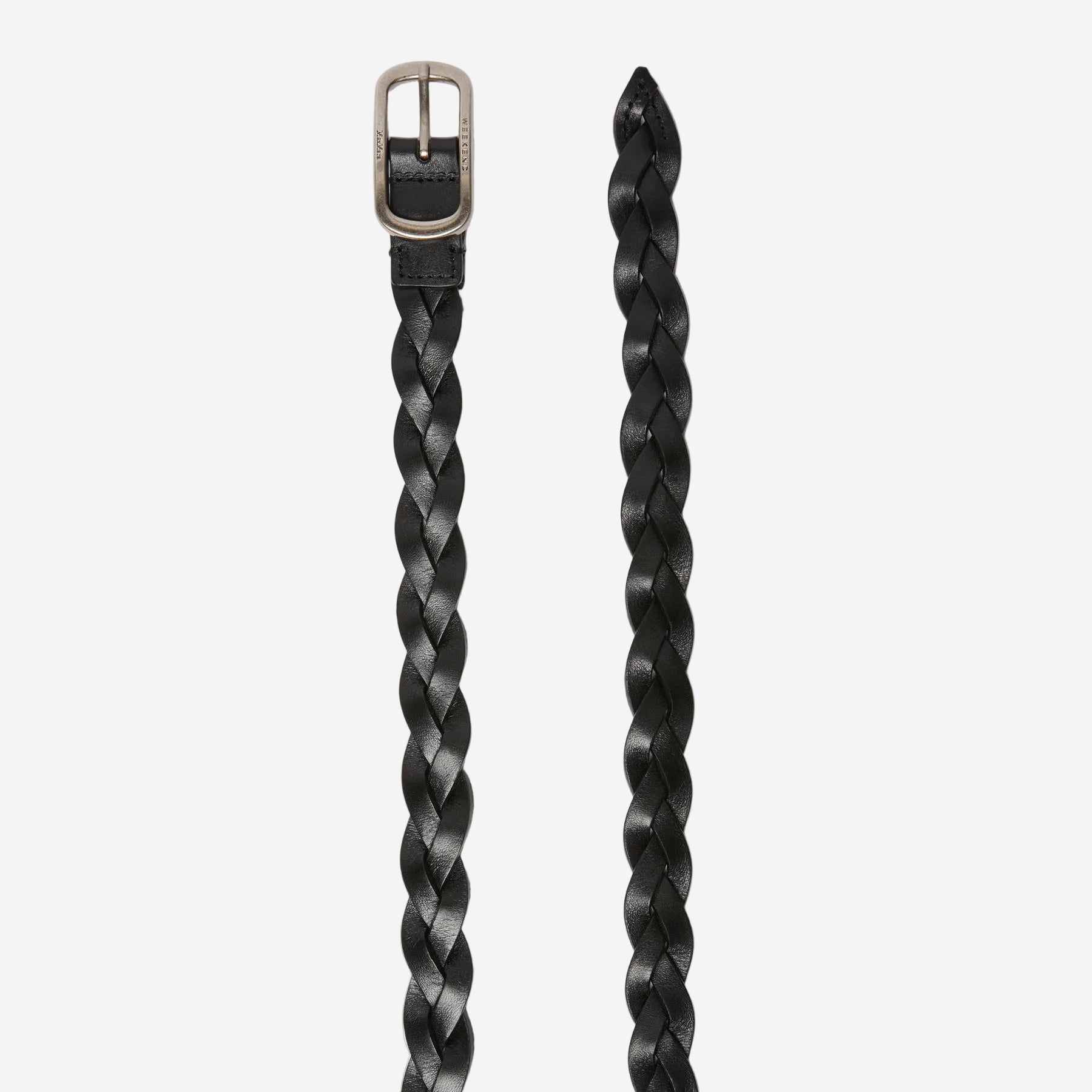 Two braided black leather belts with buckles on a light gray background