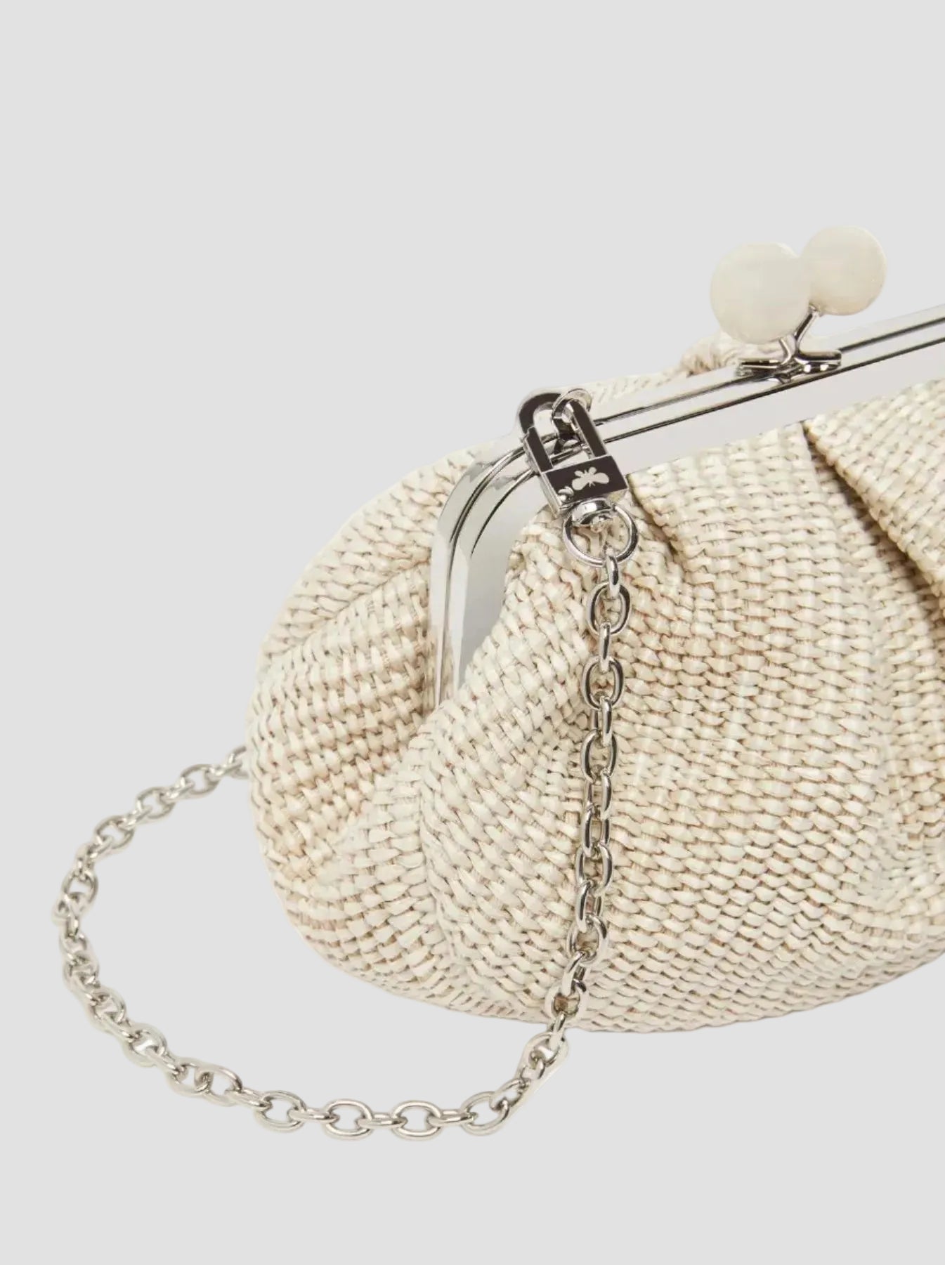 Beige woven handbag with a chain strap on a white background
