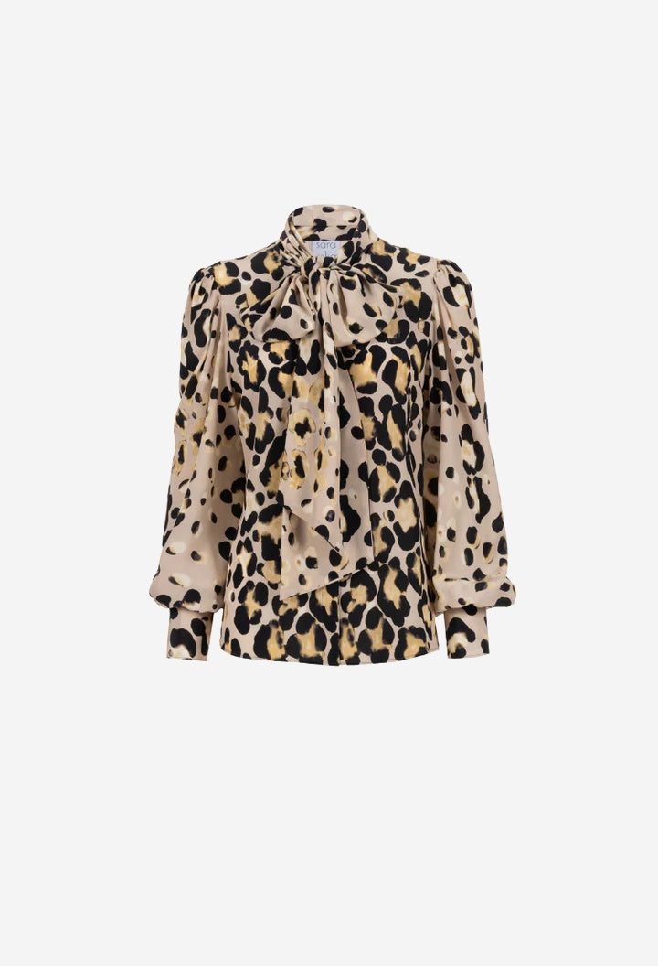 Leopard print blouse on a white background