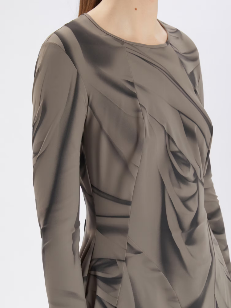 Brown long-sleeve top with draped design on a white background