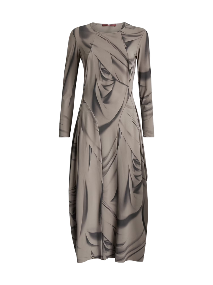 Long-sleeve dress with abstract pattern on a white background