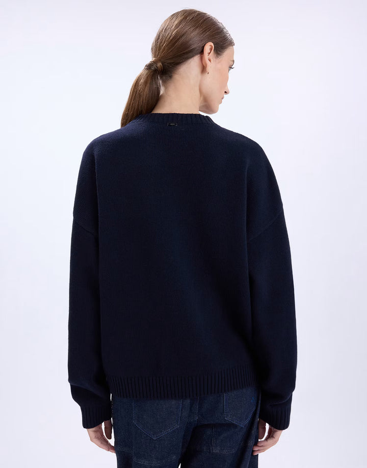 Back view of the HIGH Casually navy wool sweater with ribbed hem and cuffs