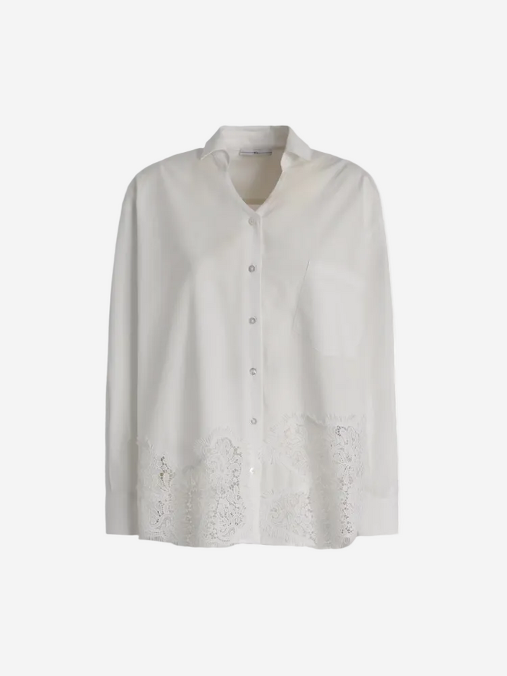 White blouse with lace details on a white background