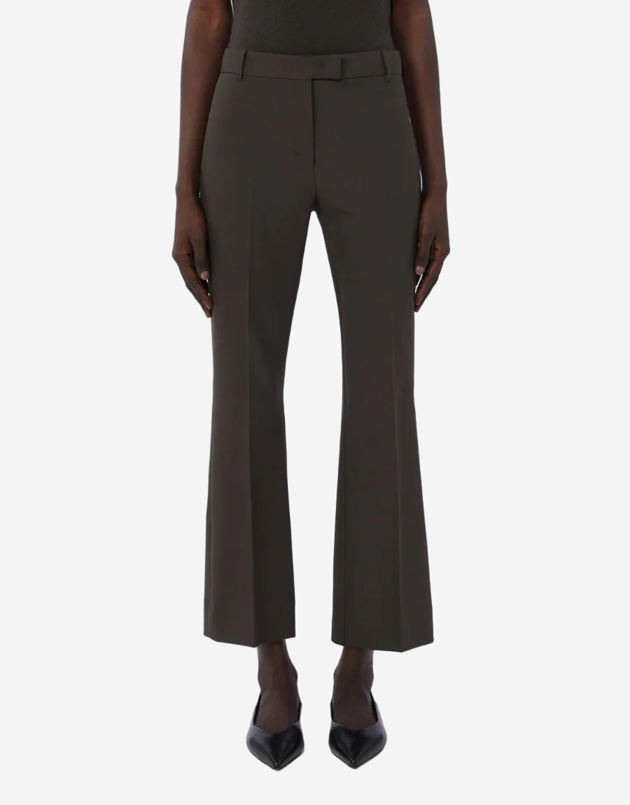 Dark brown high-waisted pants worn by a model on a white background
