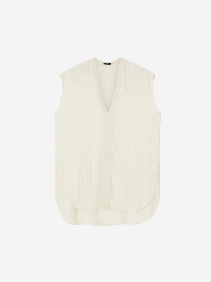White sleeveless top on a white background