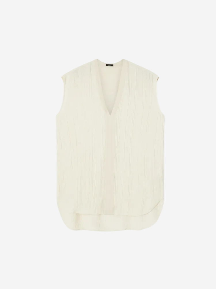 White sleeveless top on a white background