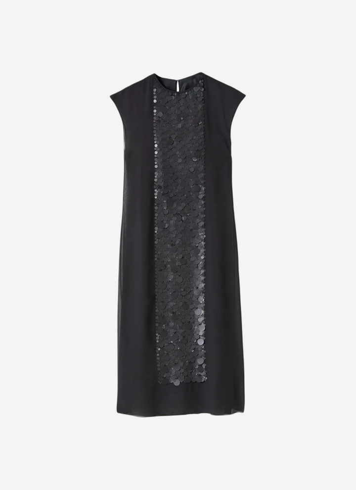 Black dress with sequin panel on a white background
