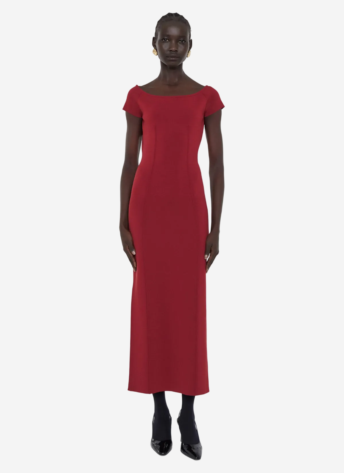Red dress worn by a model on a white background