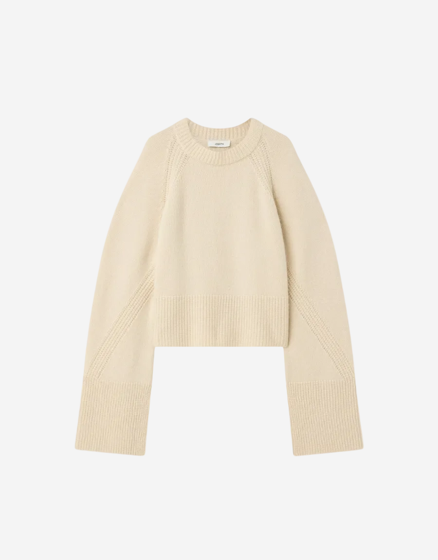 Beige sweater on a white background
