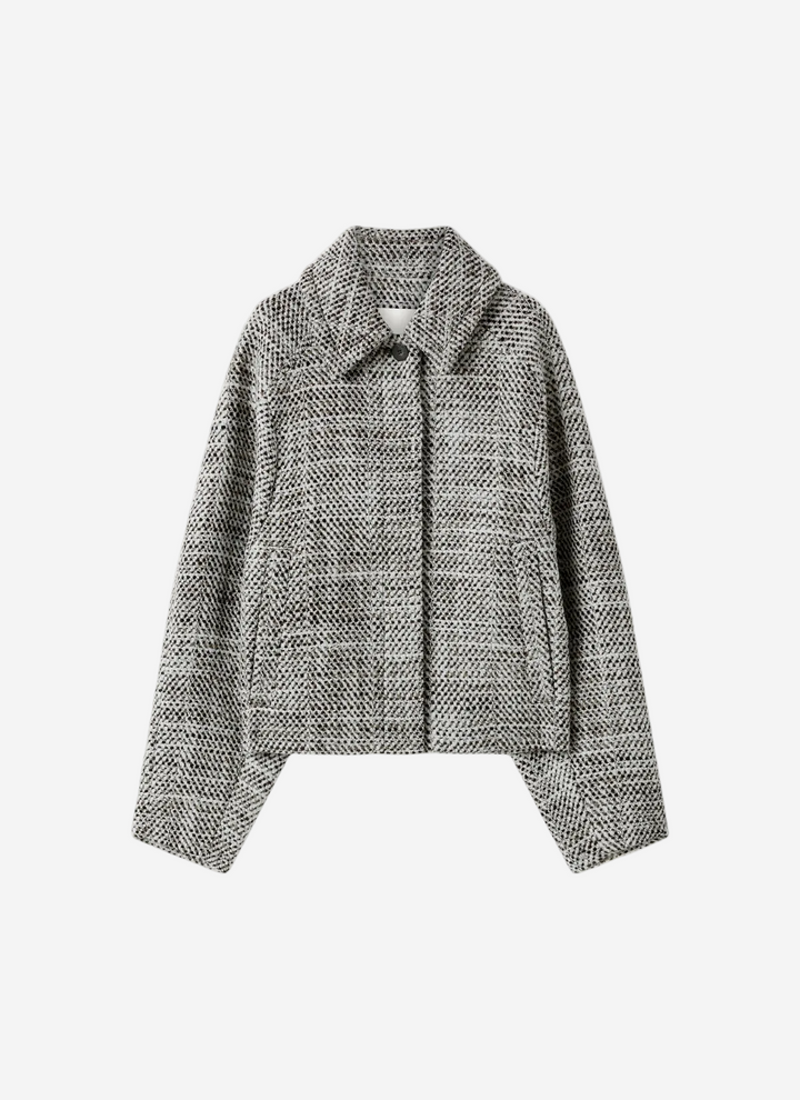 Textured gray jacket on a white background