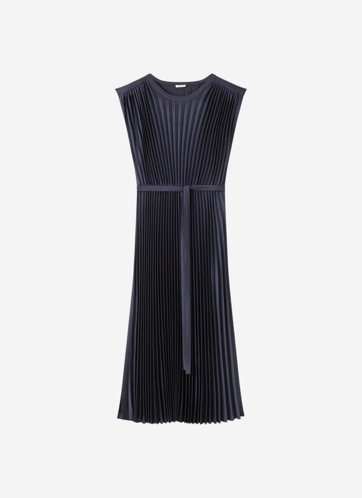 Navy pleated dress on a white background