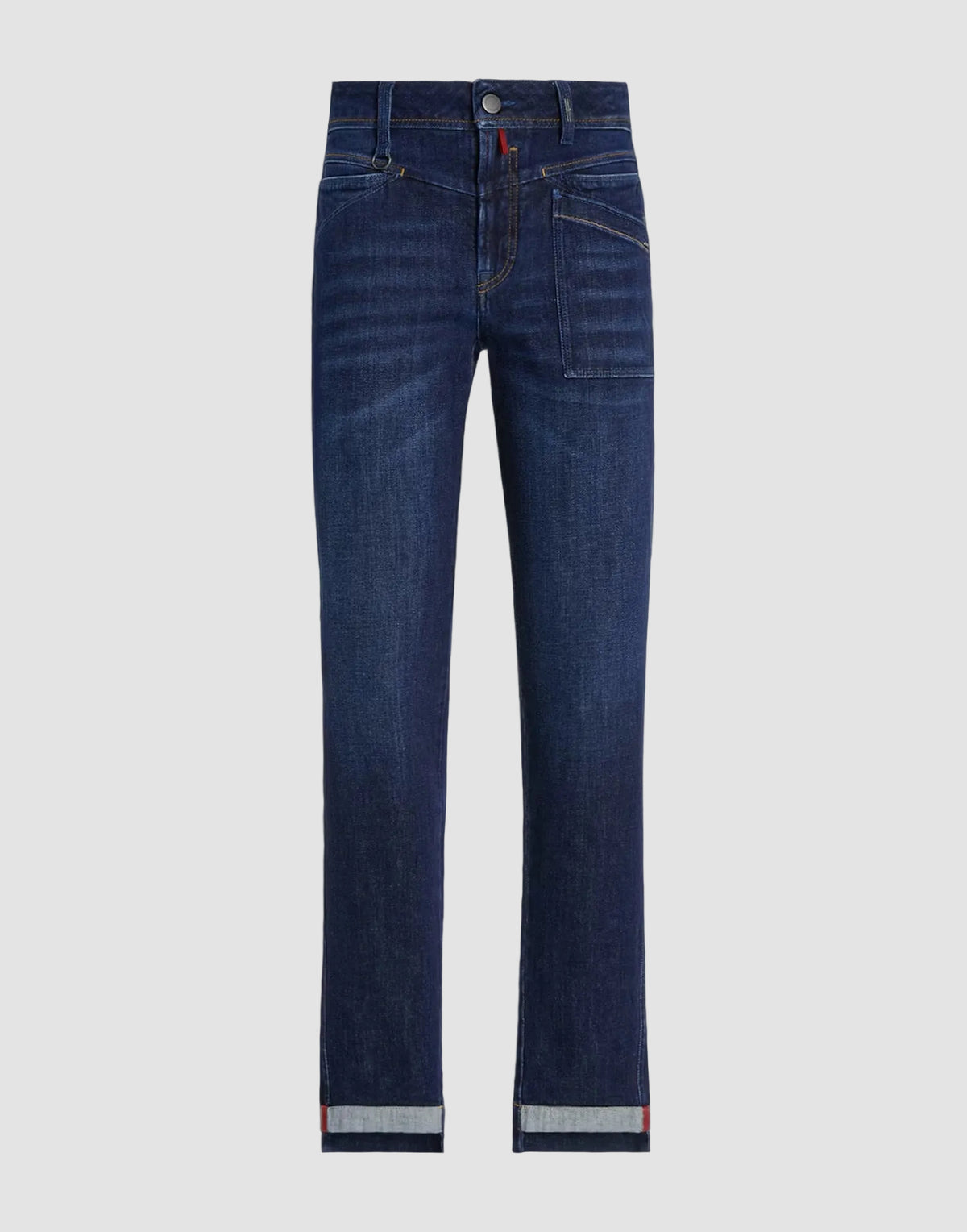A pair of dark blue denim jeans with a straight-leg fit, shown flat against a solid black background. The jeans feature a subtle whiskering effect on the upper thighs and a rolled cuff at the hem revealing a light gray inner lining.