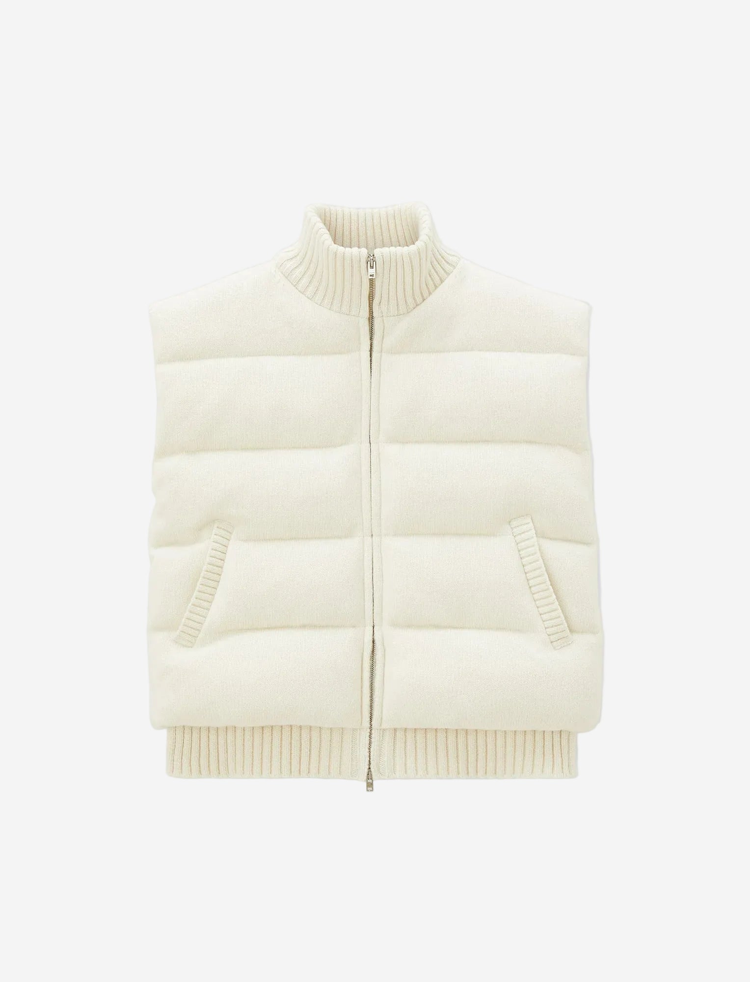 White puffer vest on a light gray background