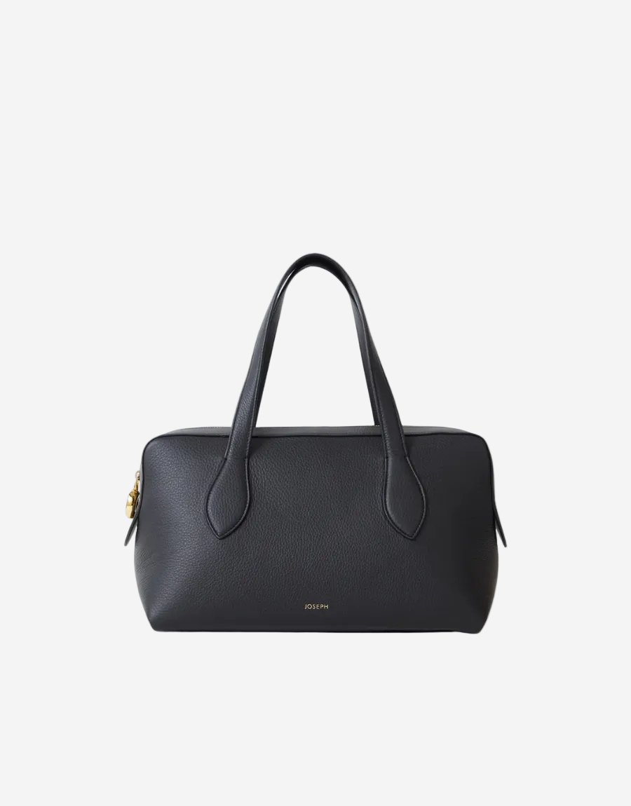 Black handbag on a white background