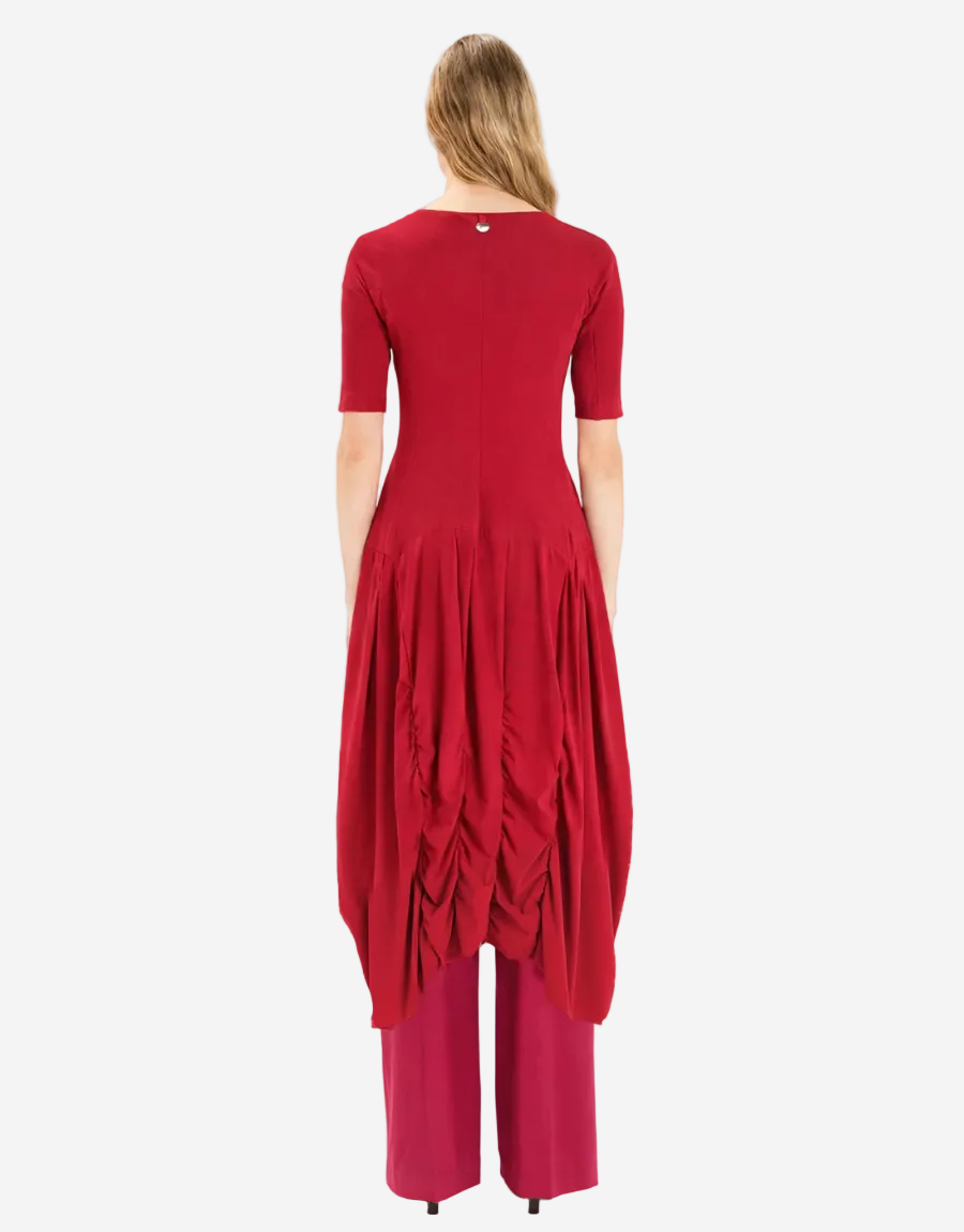Red dress with a unique design on a white background