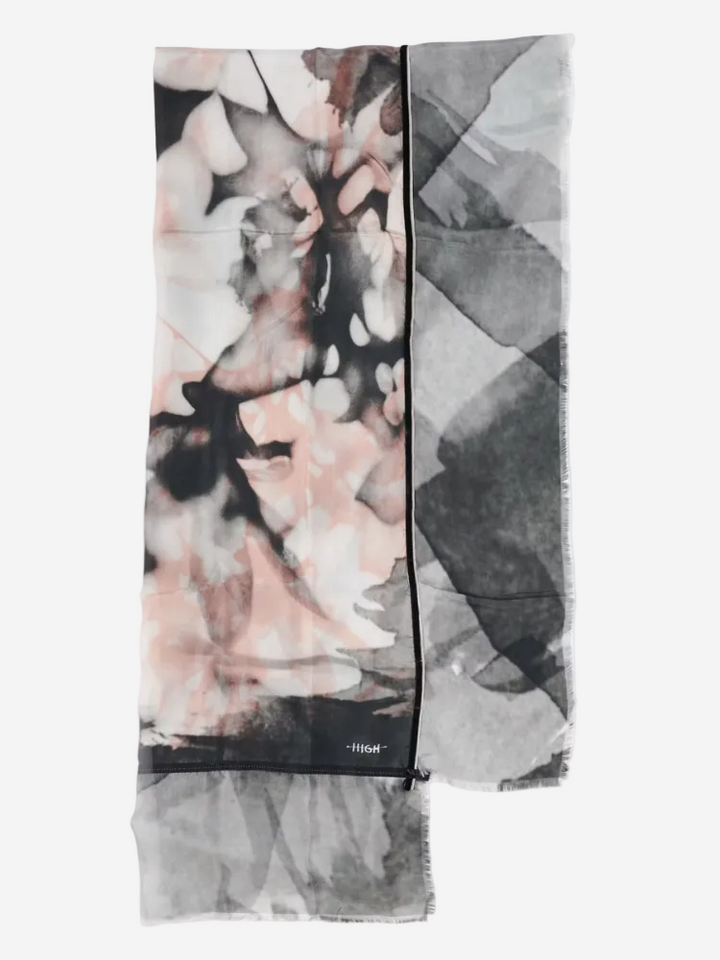 Floral and abstract patterned scarf on a white background