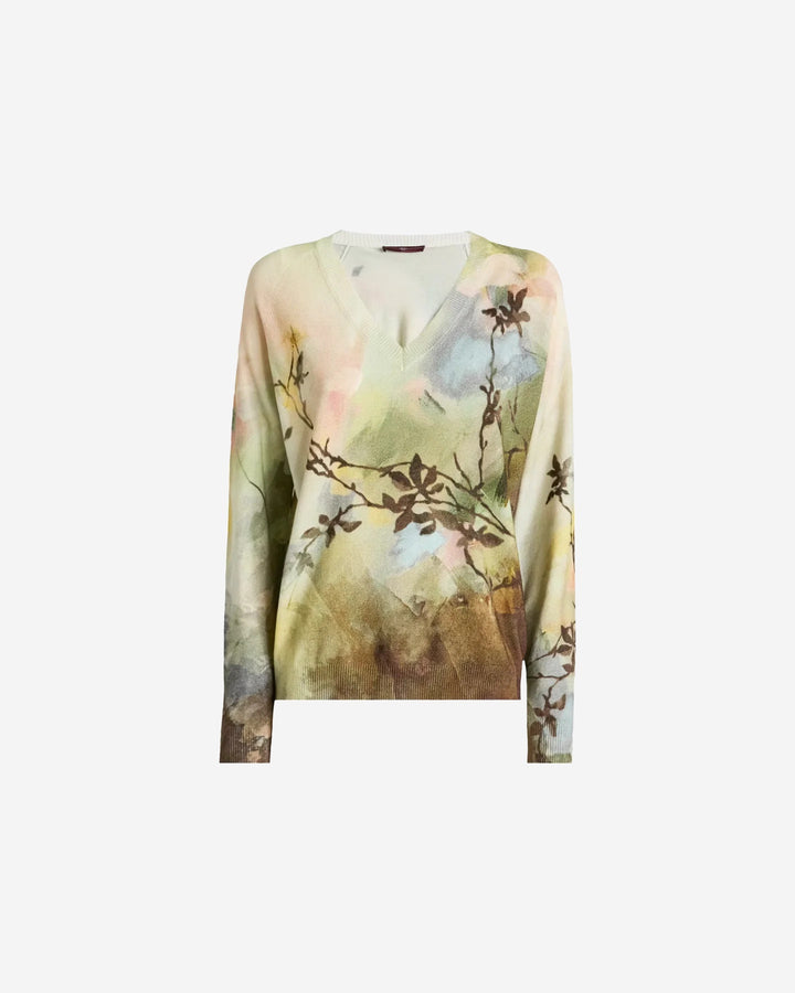 Floral patterned sweater on a white background