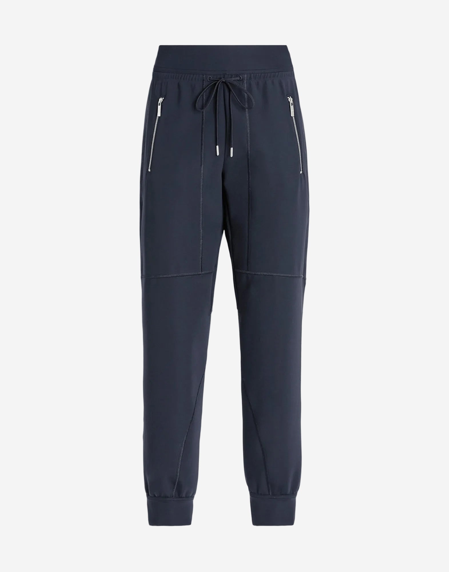 Navy blue jogger pants with zippers on a white background